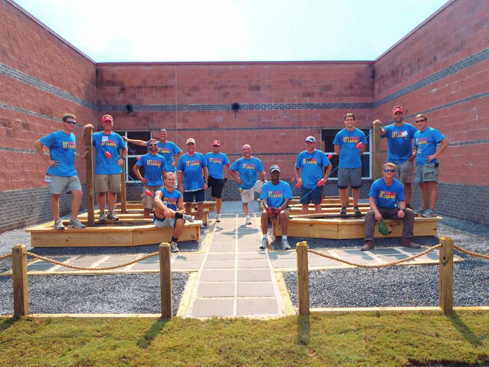 In just one day, a school garden was built! That's teamwork.