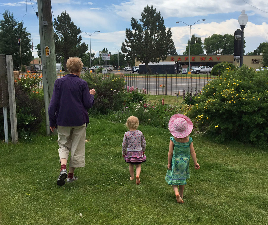 My mom doing what she does best... spending time with her granddaughters. This day we were exploring flowers at the local park.
