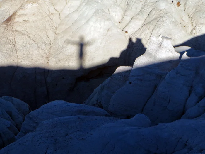 My shadow at sunset high on a mesa. Blessings.