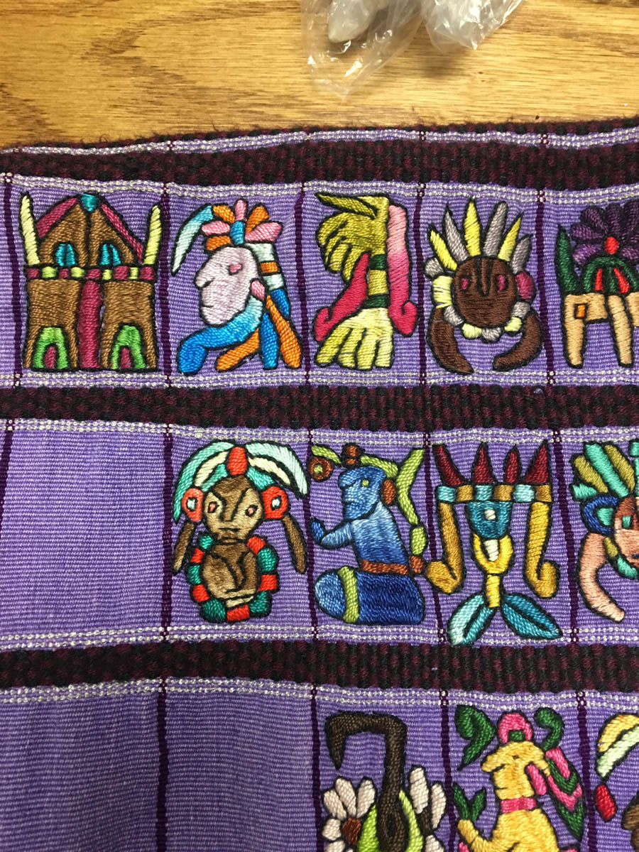 In this huipil, everything except the figures was woven. The figures were embroidered.
