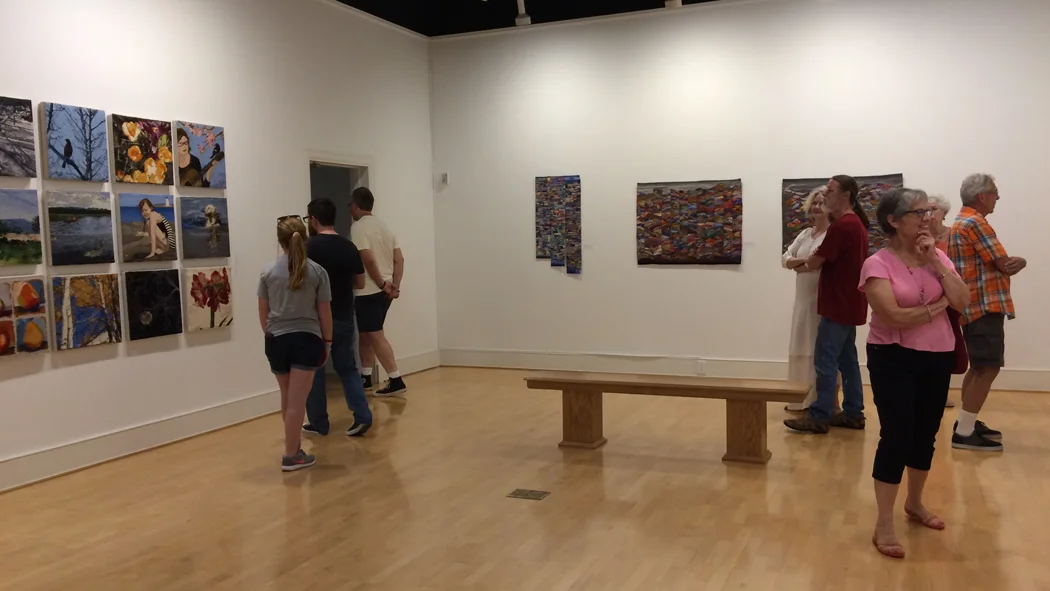 Kathy Spoering's twelve calendar pieces are on the wall to the left. Janette Meetze's pieces are on the wall straight ahead.