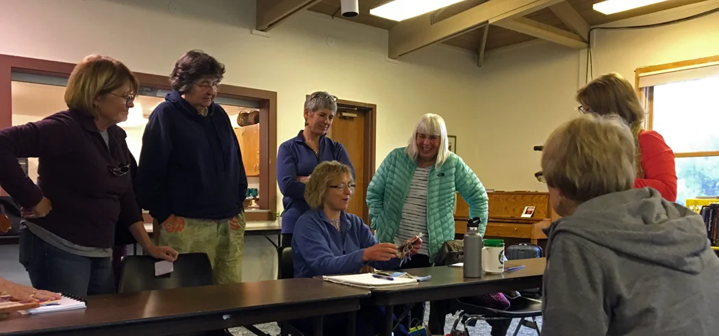 Retreat review: Mar, Ute, Paula, Marilyn, Leslie, Cynthie, and Jane is sitting.