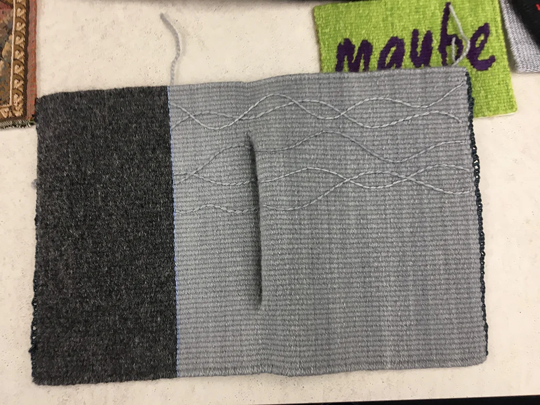 Susan Iverson tapestry sample of pulled warp from March 2018 lecture in Fort Collins, CO. "Maybe" tapestry is by Terry Olson.