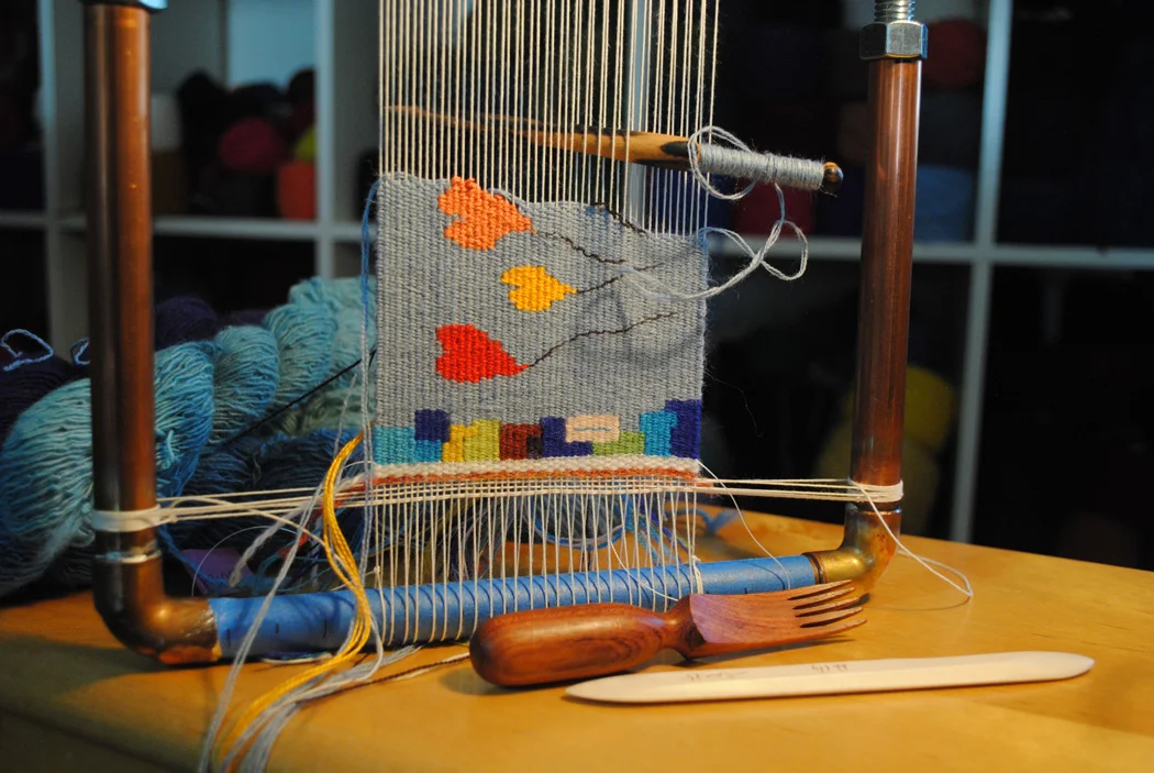 Pipe looms usually don't have an automatic way of spacing the warp. This means you can warp it for any sett you want! This is a copper pipe loom that I made. Instructions are included in my Weaving Tapestry on Little Looms online course.