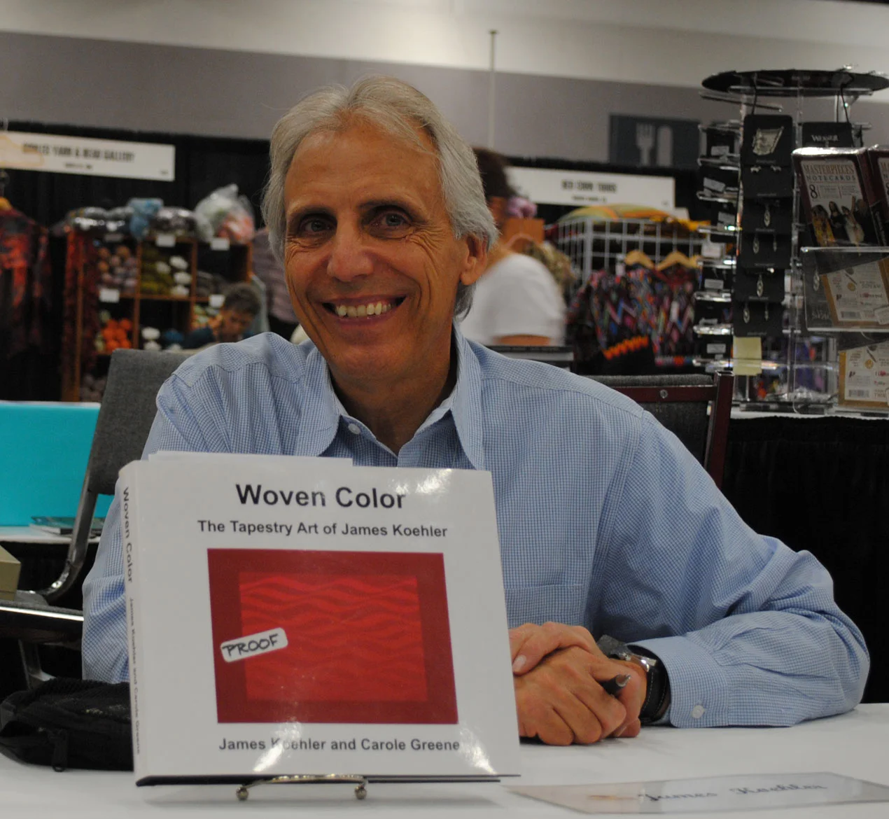 James Koehler with his book shortly after it came out at a Convergence 2010 book signing.