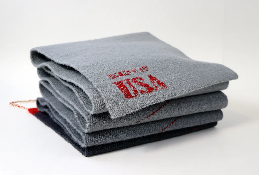 Rebecca Mezoff, Displaced: Refugee Blanket, 10 x 10 x 5.5 inches, wool & cotton tapestry