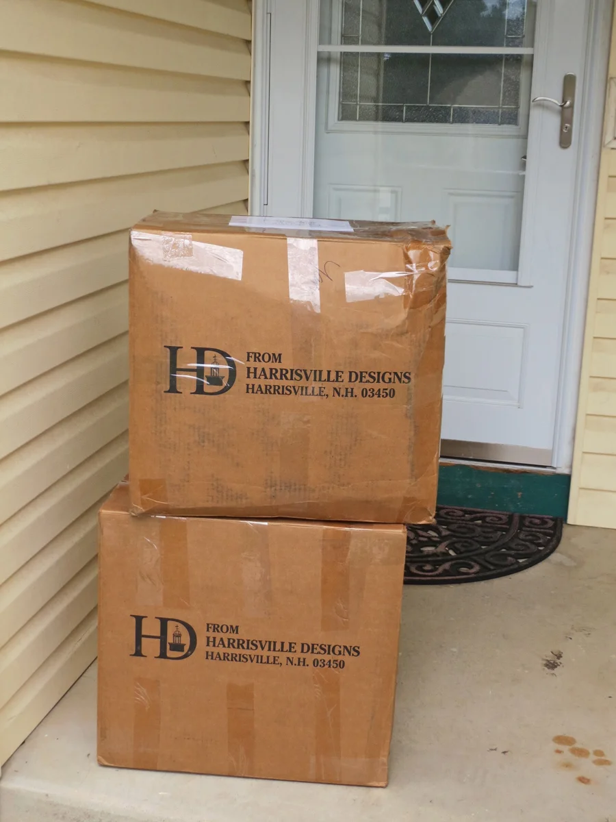 Yarn arrival: Those boxes are full of white tapestry yarn.