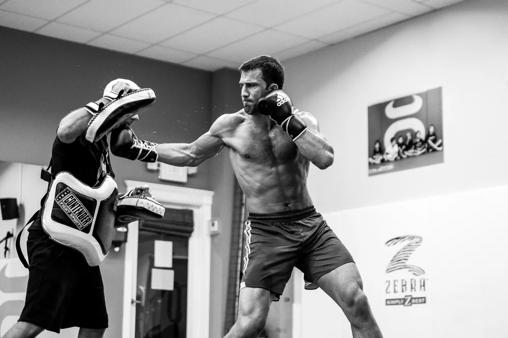 Luke Rockhold working with Henri Hooft.