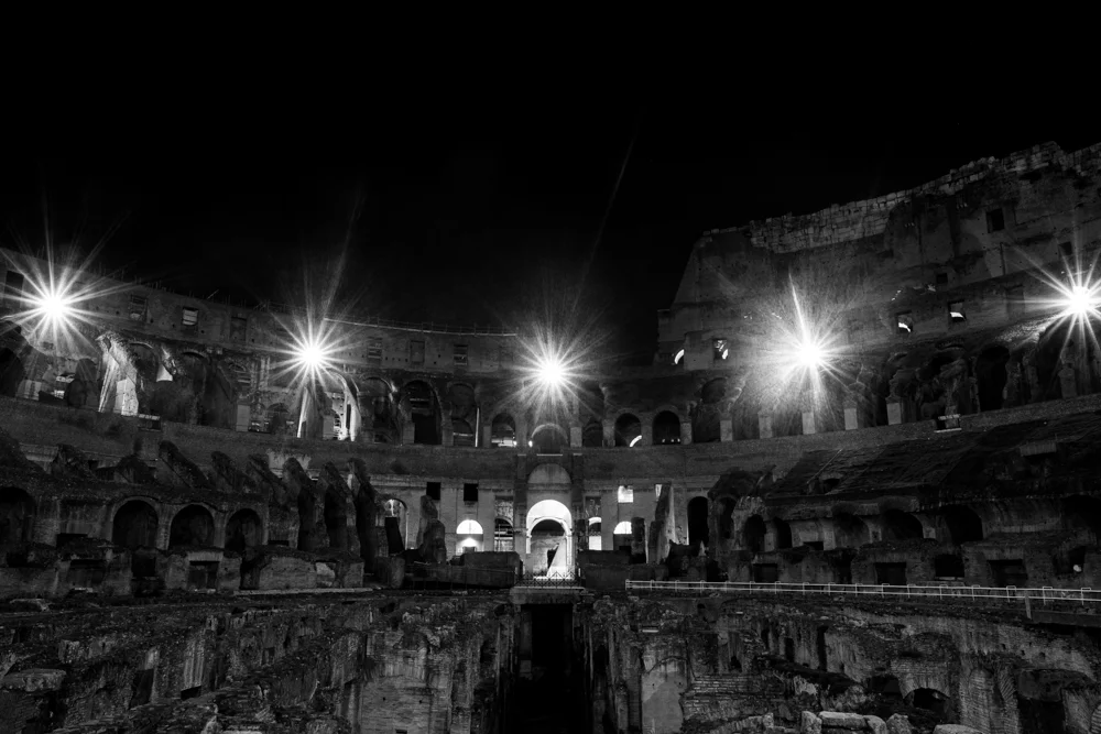 All alone inside the Colosseum at night in Rome, Italy.