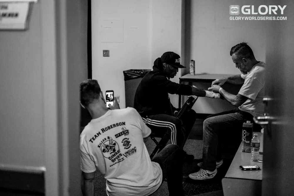 Karl Roberson gets his hands wrapped before facing off with Mike Lemaire.