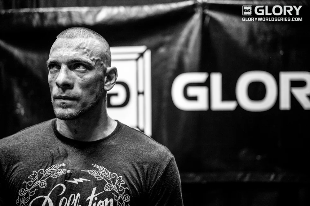 Joe Schilling watches the action backstage before his name is called to walk. 