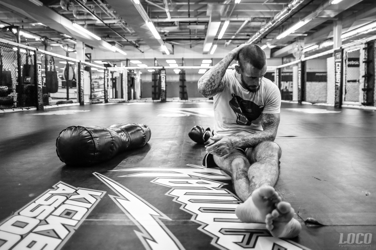 UFC fighter and former WWE superstar CM Punk takes a moment to himself after a training session at Roufusport Gym in Milwaukee.