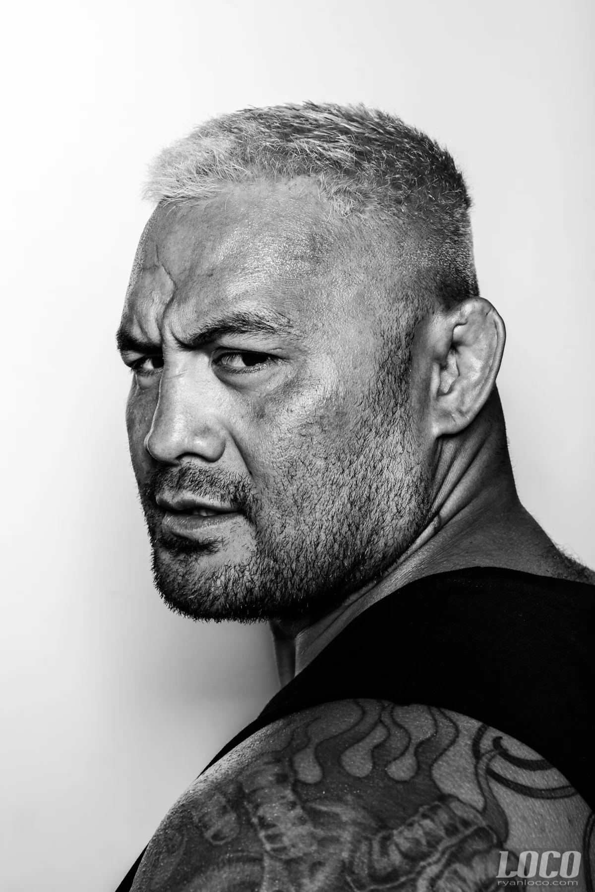 Portrait of Mark Hunt, taken a week before his fight with Brock Lesnar at UFC 200. I had a few minutes with Mark at his temporary residence for his training camp, and we shot this outside against the wall by the pool. Always wild how some of my fave portraits happen in the least amount of time.