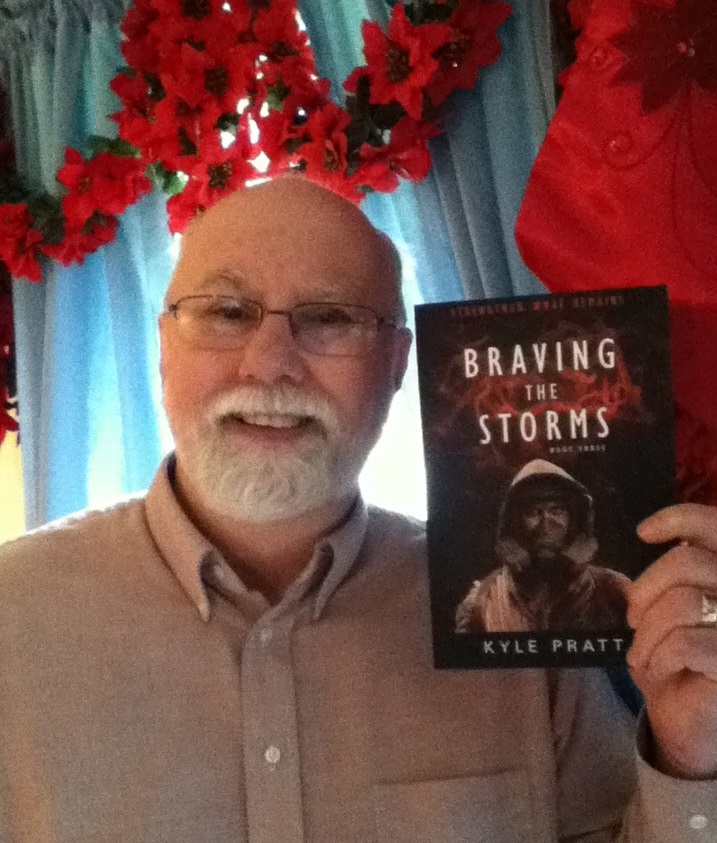 Kyle Pratt with the proof copy of Braving the Storms