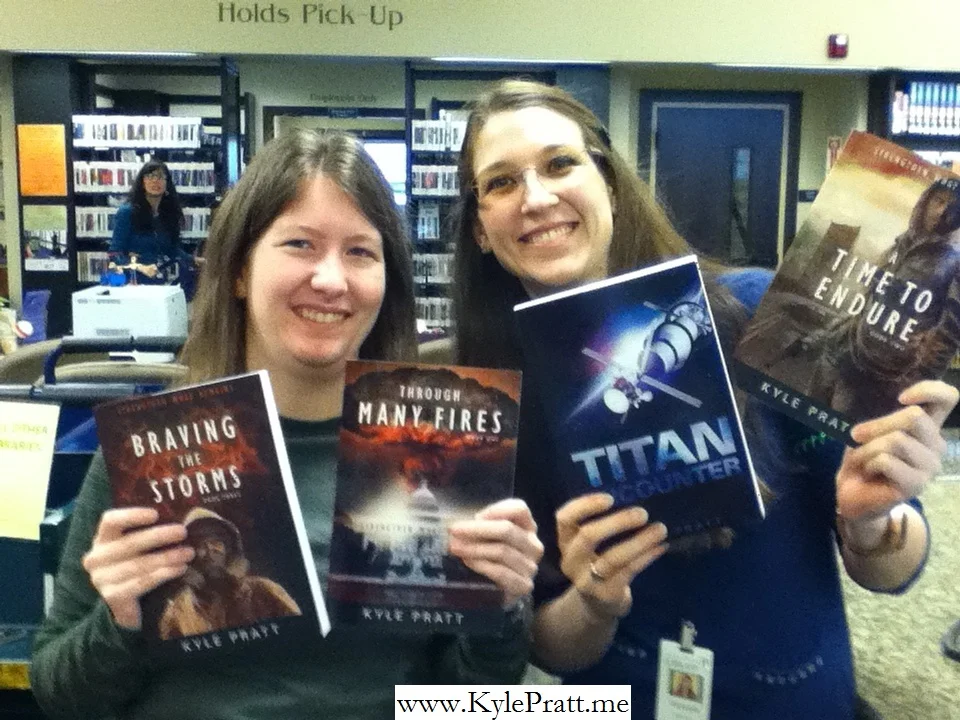 Amy and Victoria with Braving the Storms, Through Many Fires, Titan Encounter and A Time to Endure from the Chehalis, Washington Library.