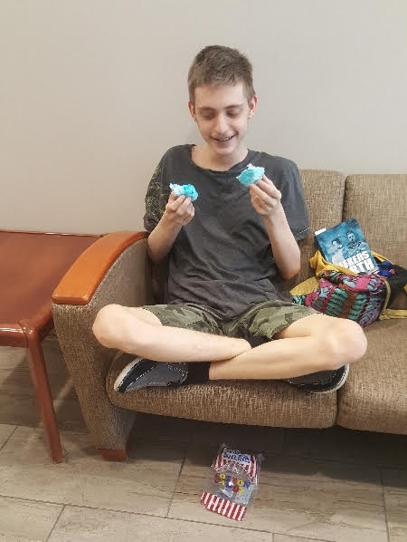 Roberto in Phoenix, Arizona. His mom thought he was eating her copy of Seekers of Earth , not a snack.