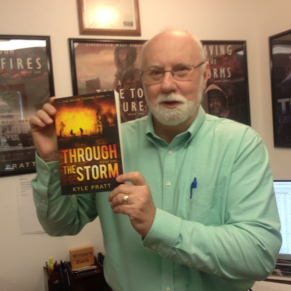 Kyle with a copy of Through the Storm