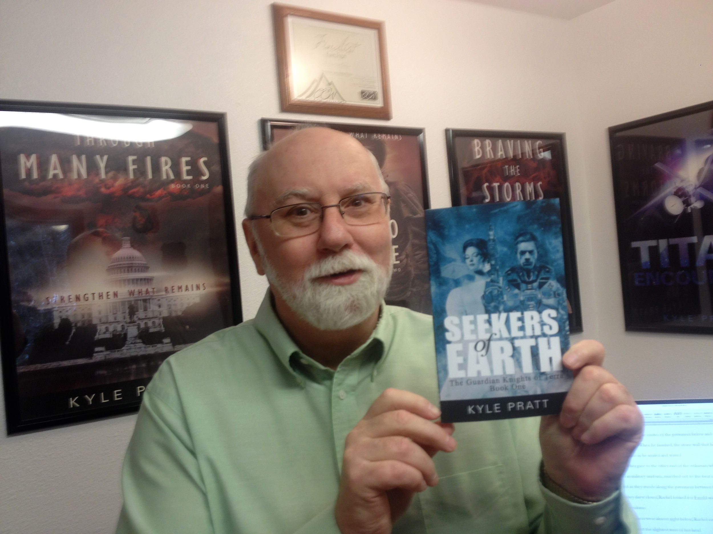  Kyle with a copy of Seekers of Earth 