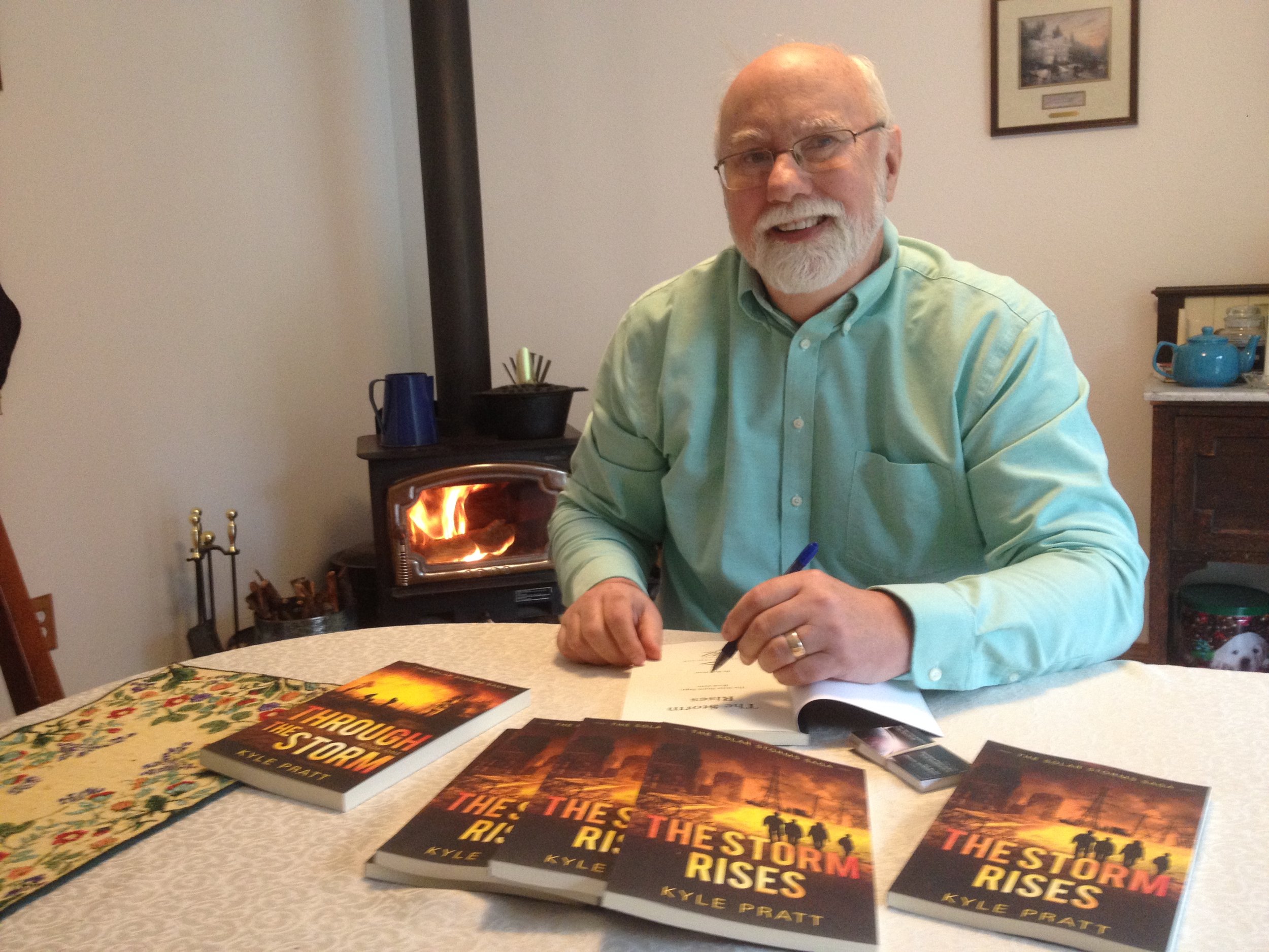  Sitting in my dining room on a cold winter day signing books for fans. 