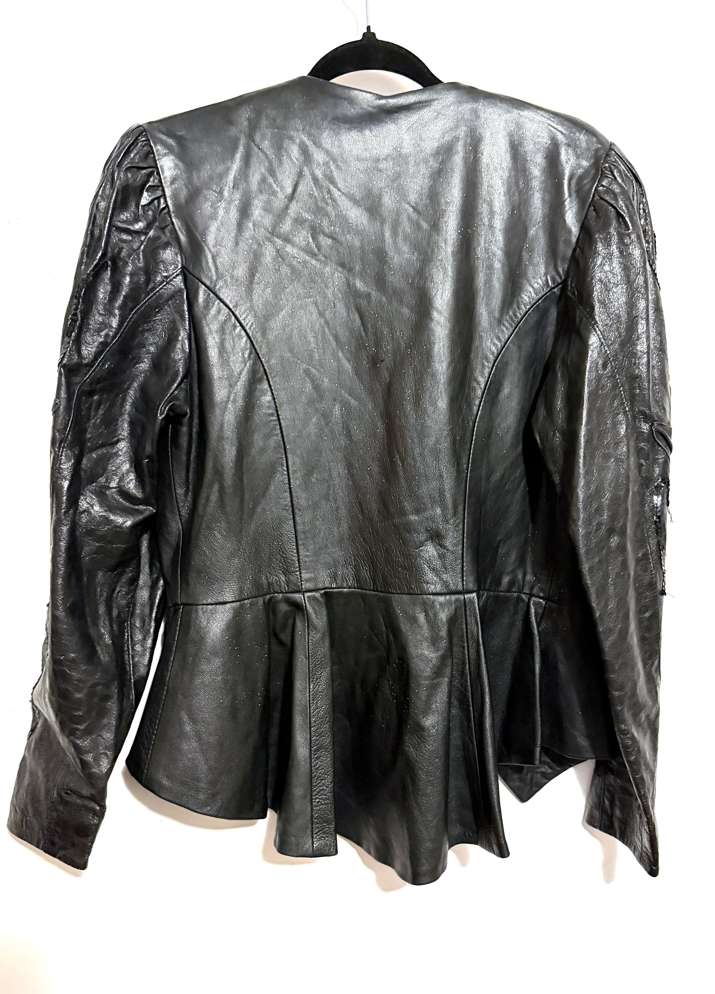 VintageBlackleatherjacketwithfloralsculpteddetailBack.JPG
