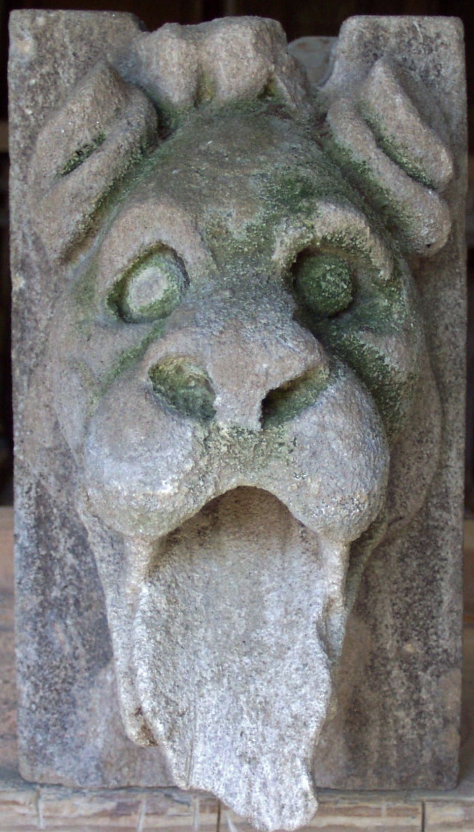 Before: Stone gargoyle with a broken tongue... Ouch!
