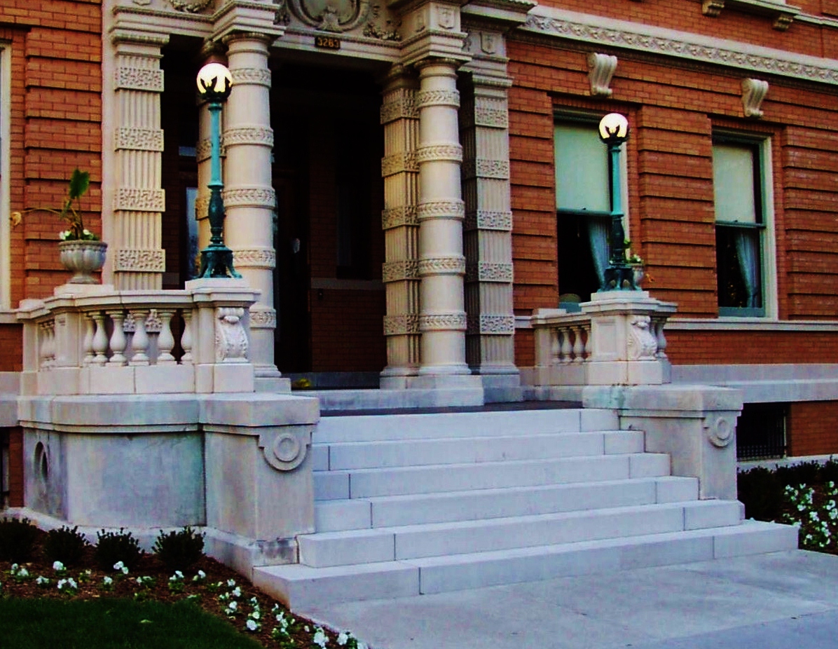 After: After setting new limestone steps on a concrete foundation we restored all of the terracotta balustrade.  Lee Lindsey  Stone Works, St. Louis, MO