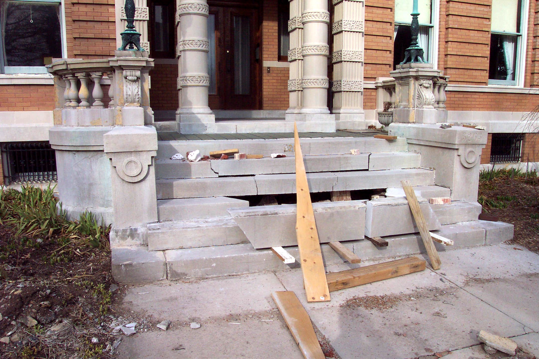 Before: This is the way another contractor left this project! The Carthage Limestone steps and terra cotta balustrade are in need of repair.