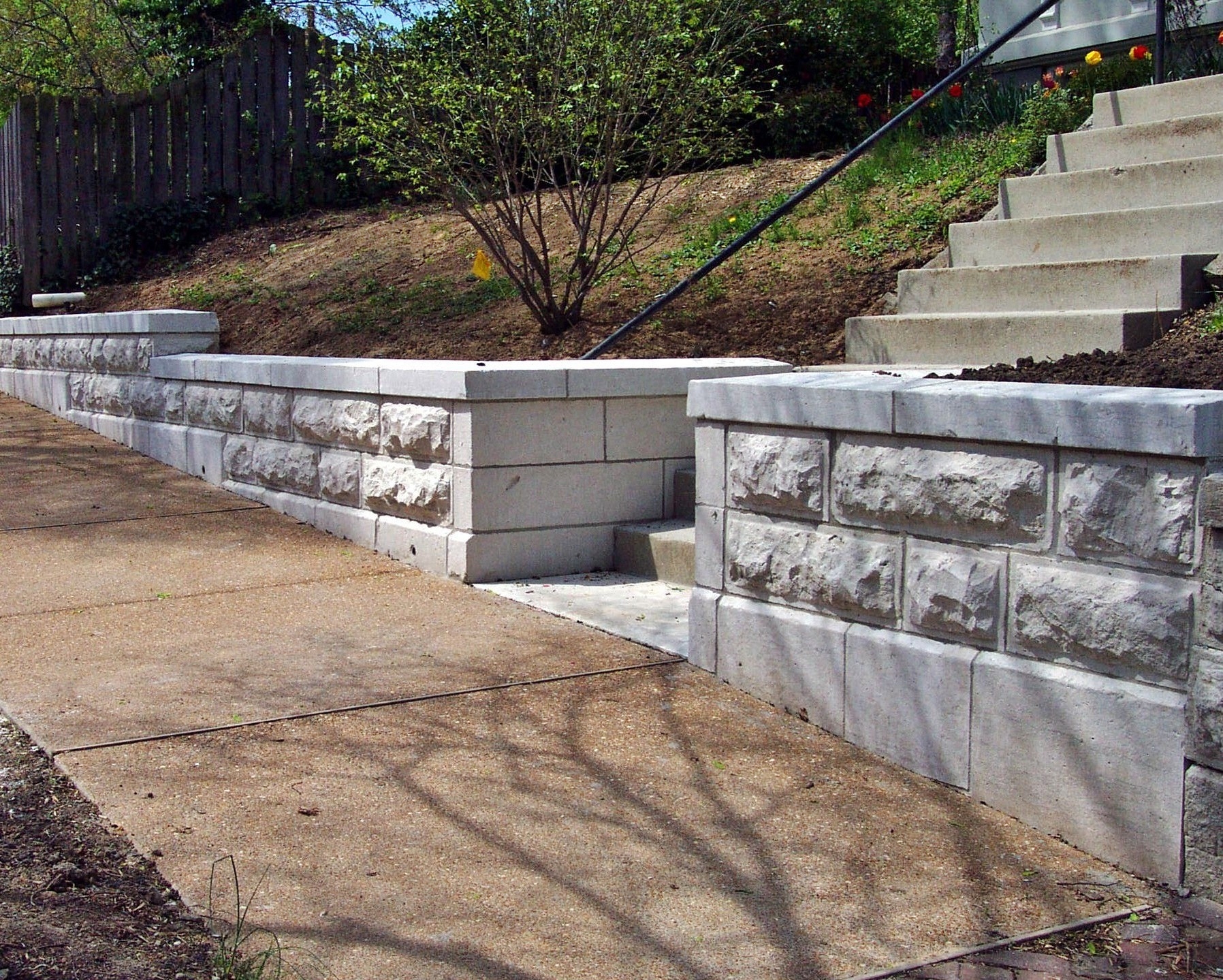 Limestone Retaining Wall replaced with new stone and set level. The stone was cut the same as the origional wall. - Stone Works - Lee Lindsey