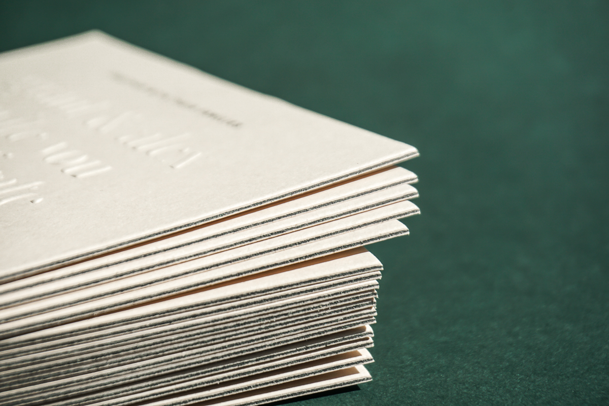 A subtle detail a touch of black in these triple mounted invitations