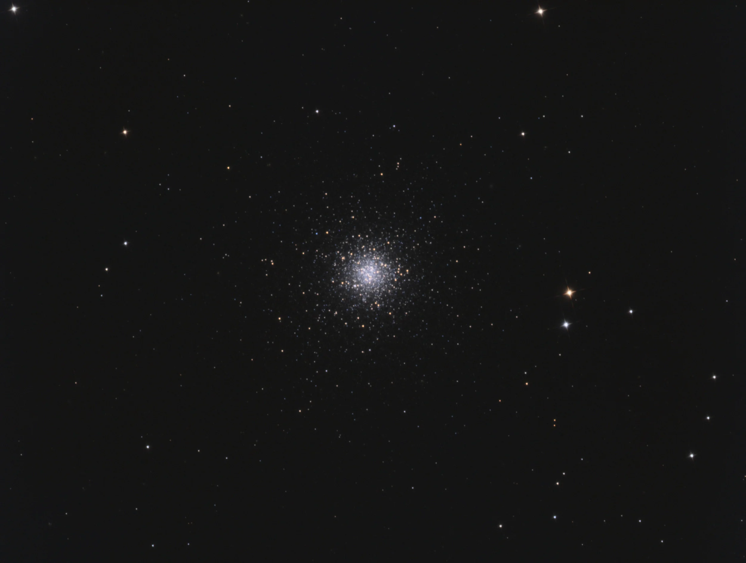 Messier 53 (also known as M53 or NGC 5024) is a globular cluster in the Coma Berenices constellation. It was discovered by Johann Elert Bode in 1775. M53 is one of the more outlying globular clusters, being about 60,000 light-years away from the Galactic Center, and almost the same distance (about 58,000 light-years) from the Solar system.