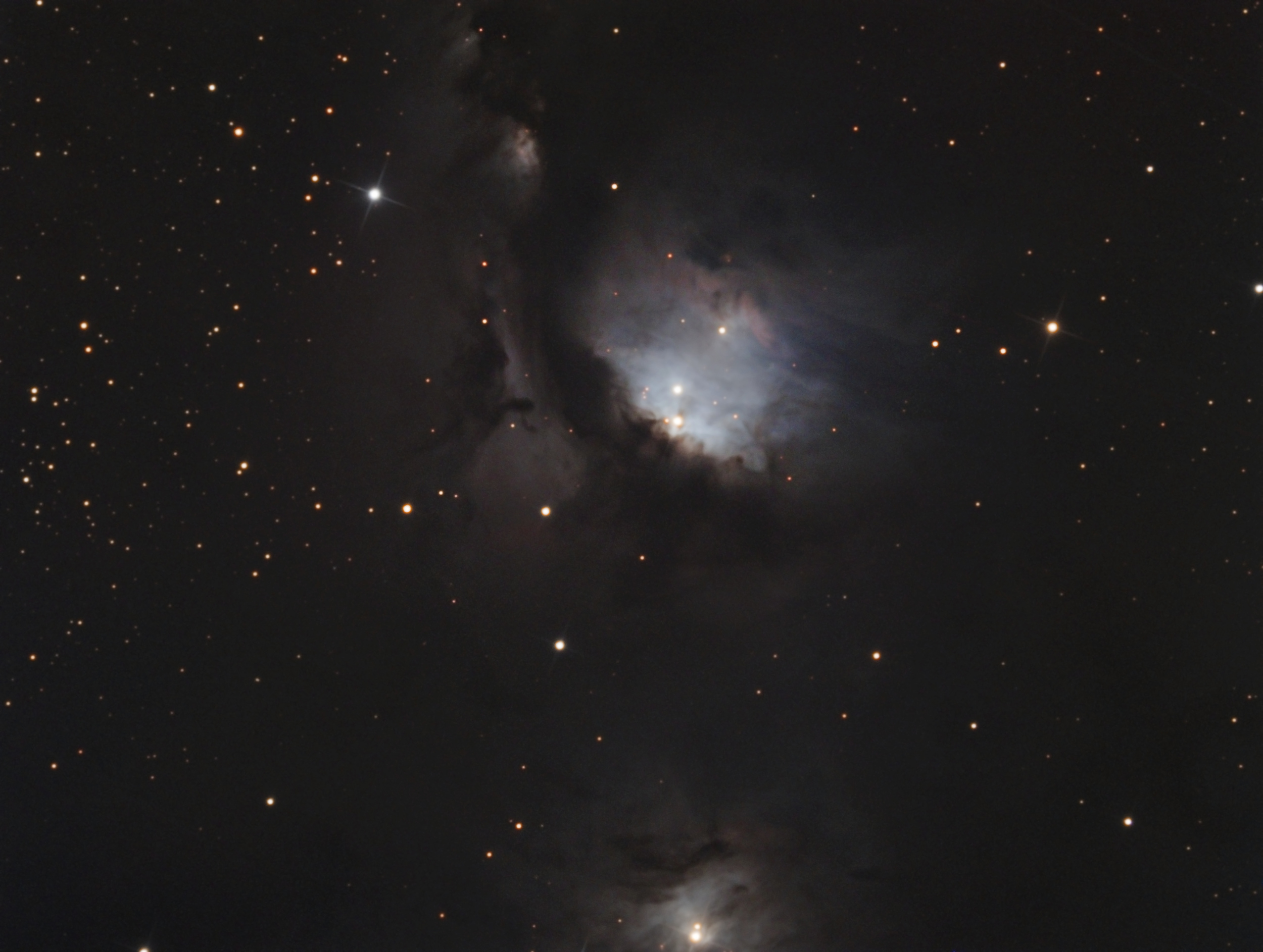 The nebula Messier 78 (also known as M 78 or NGC 2068) is a reflection nebula in the constellation Orion. It was discovered by Pierre Méchain in 1780 and included by Charles Messier in his catalog of comet-like objects that same year. M78 is the brightest diffuse reflection nebula of a group of nebulae that include NGC 2064, NGC 2067 and NGC 2071. This group belongs to the Orion Molecular Cloud Complex and is about 1,600 light years distant from Earth. M78 is easily found in small telescopes as a hazy patch and involves two stars of 10th magnitude. These two stars, HD 38563A and HD 38563B, are responsible for making the cloud of dust in M78 visible by reflecting their light. About 45 variable stars of the T Tauri type, young stars still in the process of formation as well as some 17 Herbig–Haro objects are known in M78.