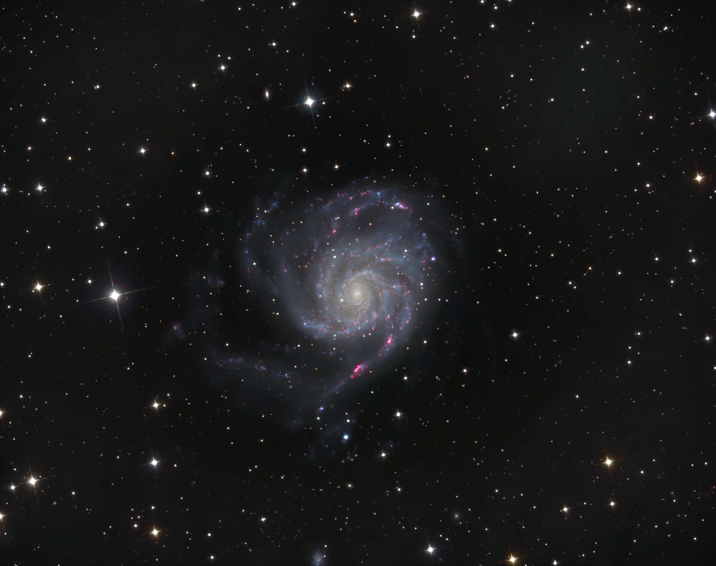 M101 – The Pinwheel Galaxy in LRGB with Ha: A Four-Night Journey Across Two Skies
