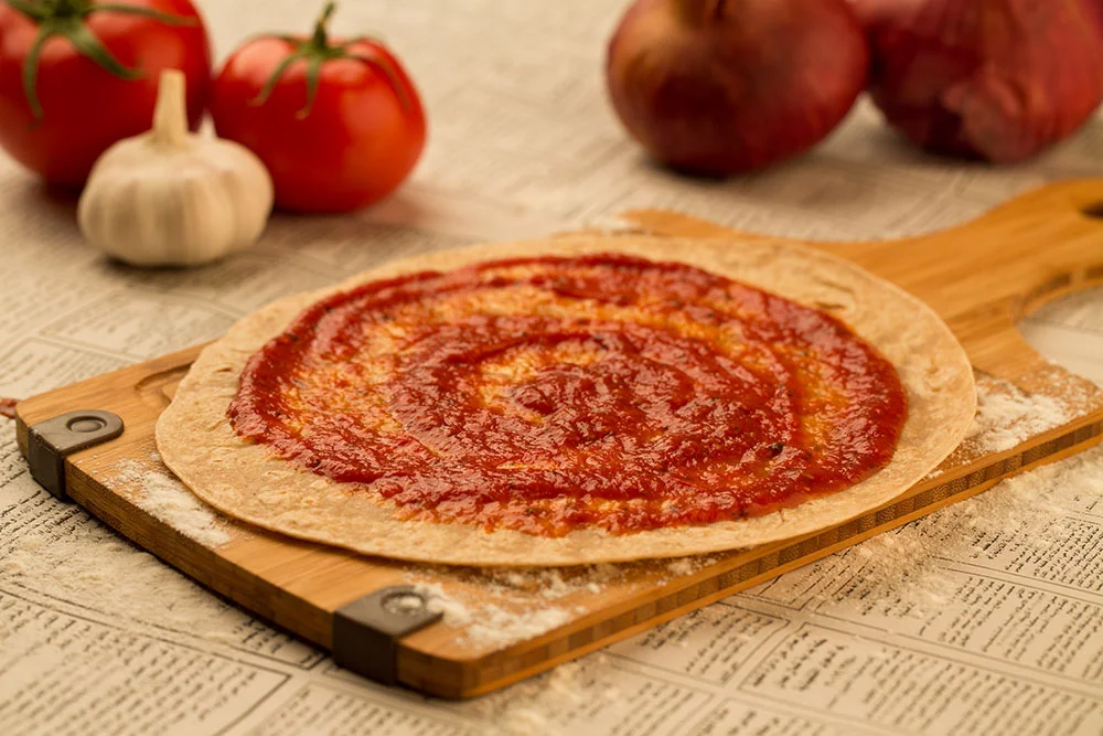 2. Spread ready made, off the shelf, pizza sauce