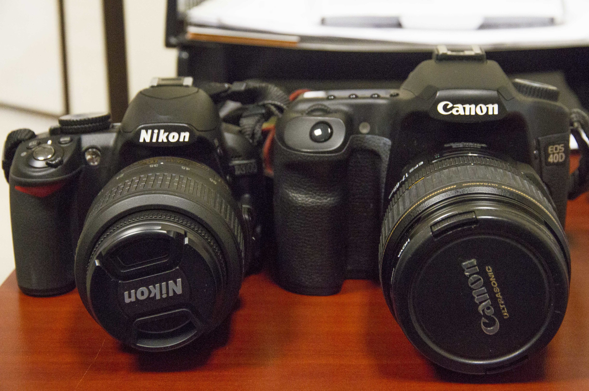 The Nikon D3100 is an entry level camera and the Canon 40D is an intermediate level camera. The models are not equally comparable © 2013 Stephanie Canarte