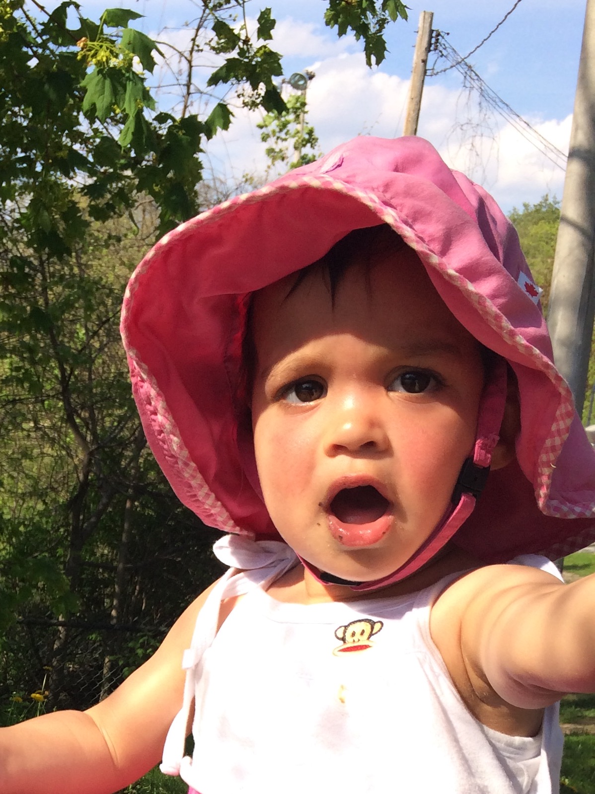 My daughter Maya, 2, showing me her best "ah" vowel. You can never start to young!