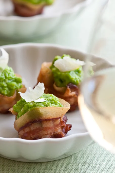 roasted garlic pea puree in pancetta cups