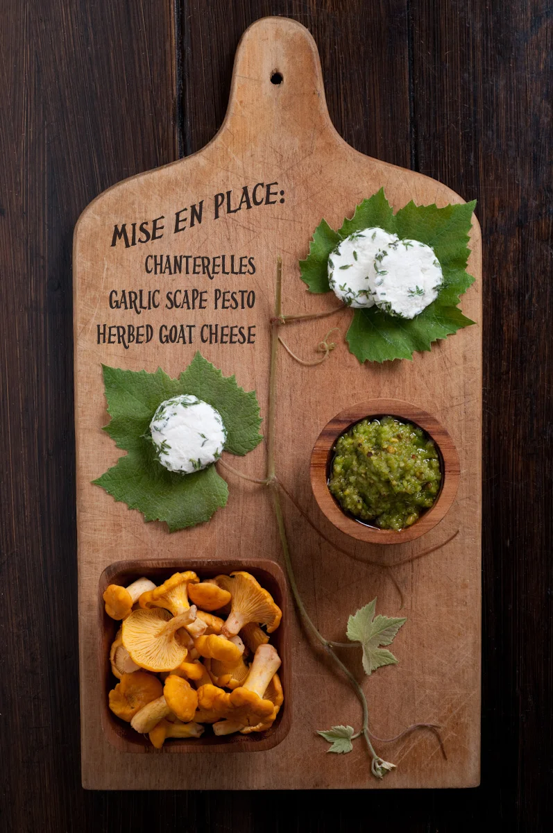 cutting board mushrooms pesto goat cheese