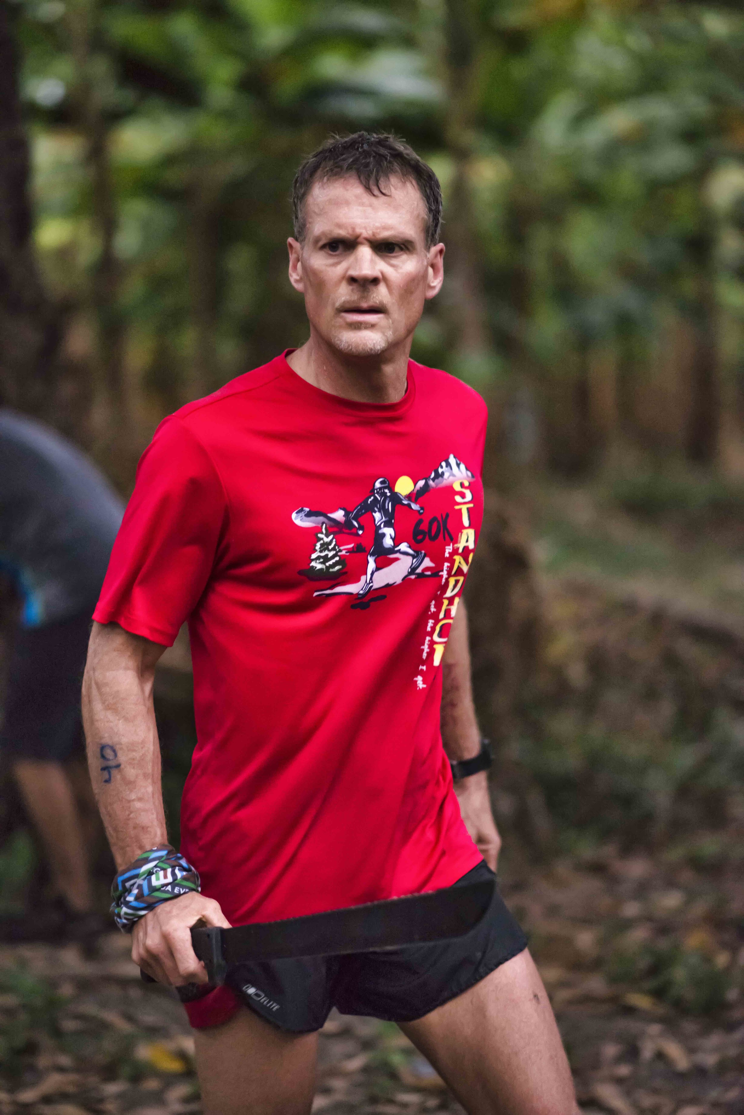 Mark Wheeler harvesting plantains during the Survival Run. Mark finished the Survival Run and the 100k, becoming one of two Devil's Double finishers in 2015 Photo by Jeff Genova Photography