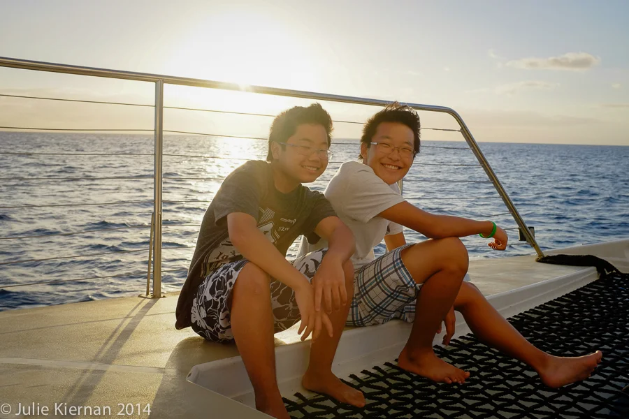 52.2.29 Mosaic The boys sailing in Oahu.