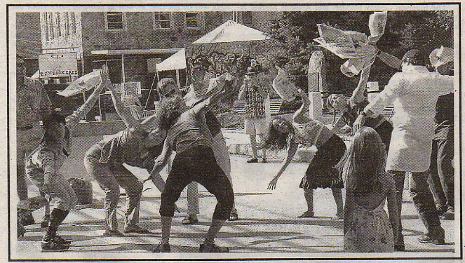 Newspaper dance on mainstreet; bringing the Mettler-based method of group dance to the street. Madison County Celebrates Art street festival.