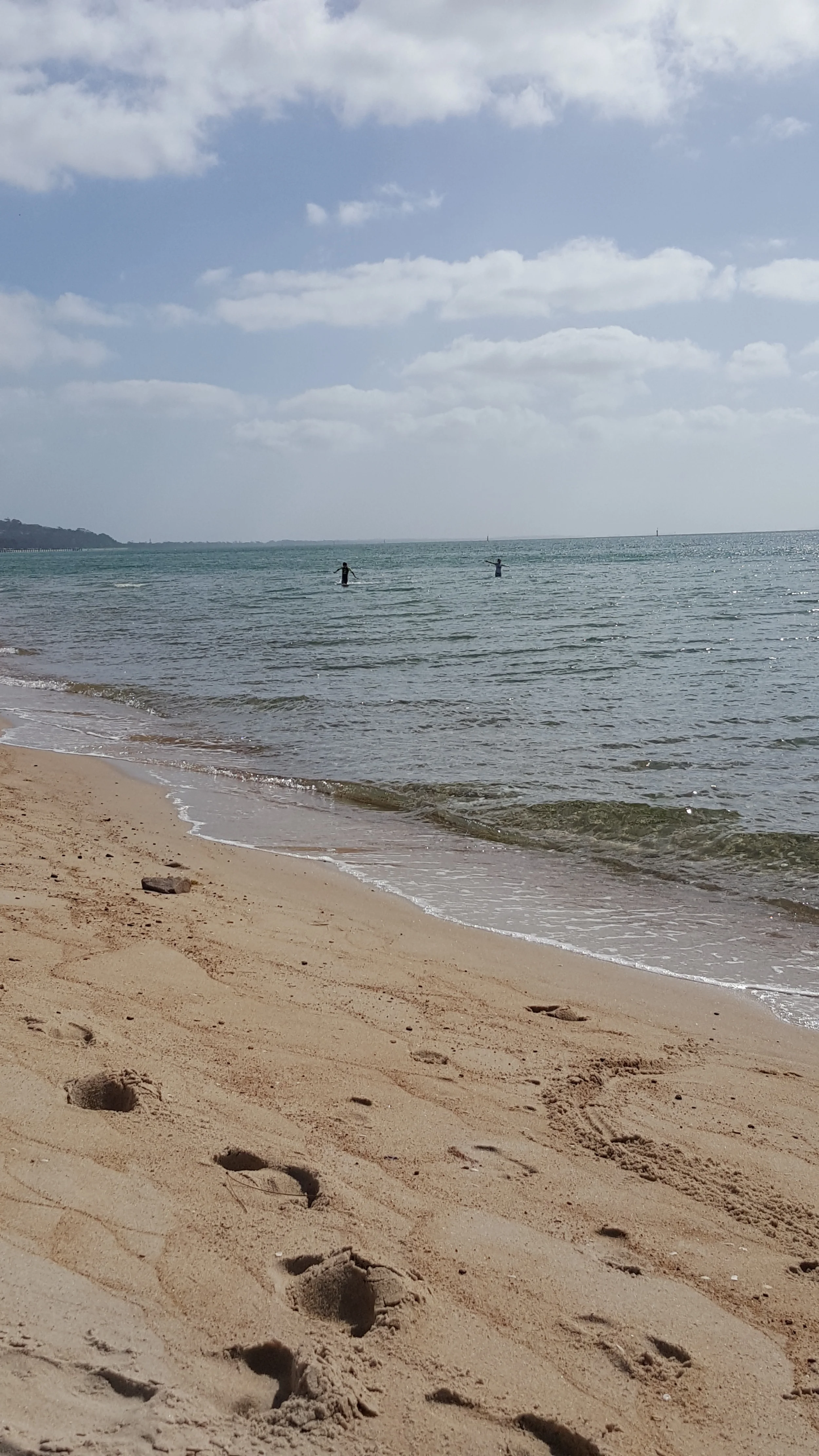 Kids deliriously happy in the beach.