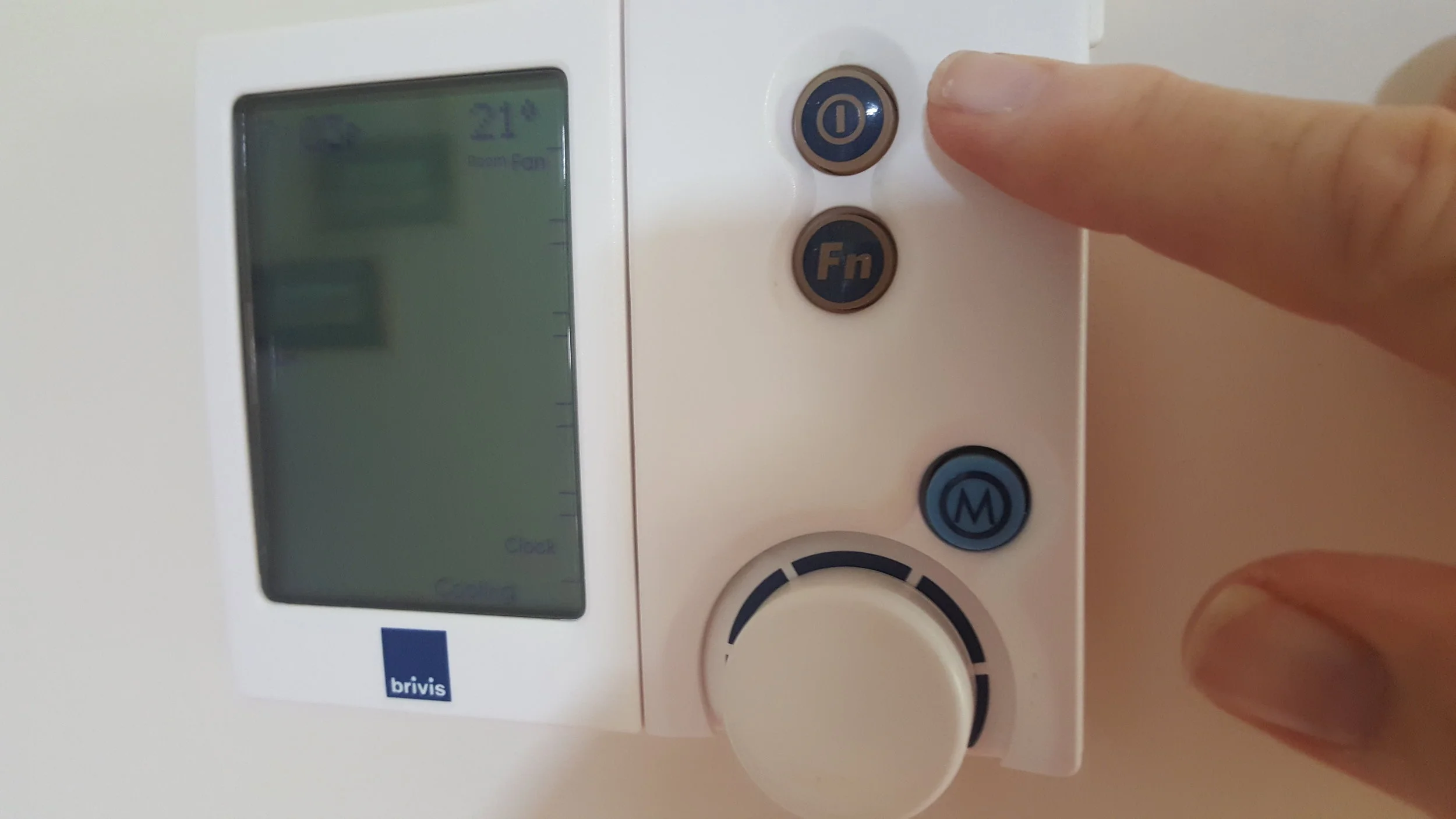 Air-conditioning Control Panel - On/Off Button - it is set at 21 degrees on the cooling setting (summer) and 22 degrees for winter.