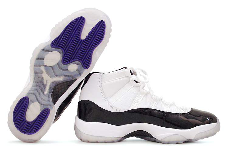 figure 4. Visible here is the Air Jordan XI’s translucent rubber outsole and its innovative full-length carbon fiber “spring plate,” which helps boost support and responsiveness underfoot. This shot also highlights the shoe’s speed lacing system, which does indeed help to speed the process of getting the shoe on and off. Just make sure to pull the laces tightly if you want to maximize fit and support—particularly on colorways that feature the more minimal ballistic mesh-based upper.
