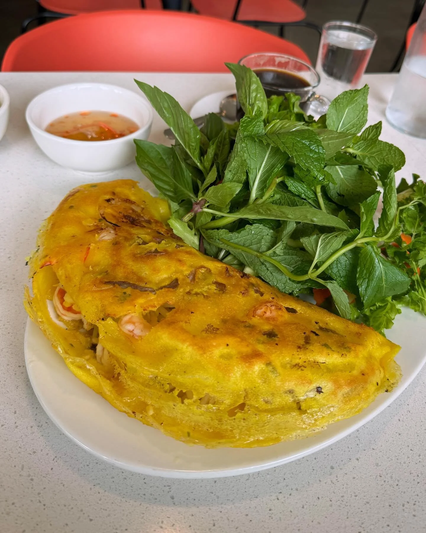 The b&aacute;nh x&egrave;o, aka Vietnamese cr&ecirc;pe, at @TanTanFoods in Beaverton is amazing. It&rsquo;s also huge and could easily be ordered as a share dish.

As noted in a previous post, calling it a cr&ecirc;pe is misleading in that there&rsqu