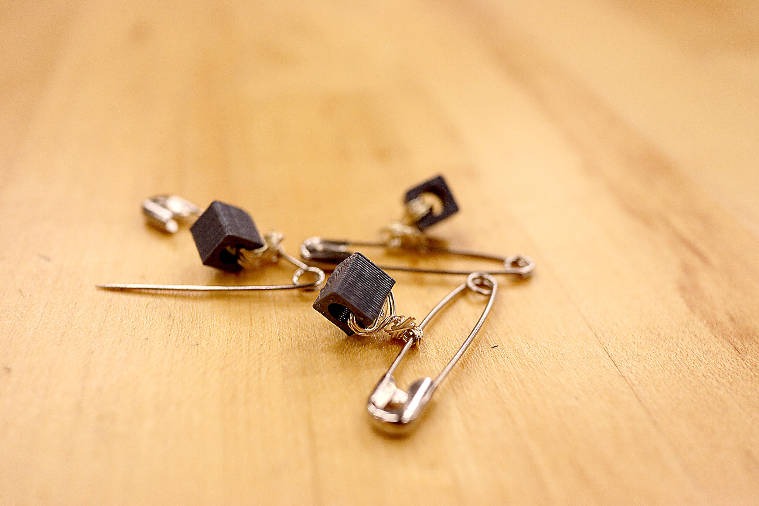  DIY clips made with safety pins, beads, and wire.  