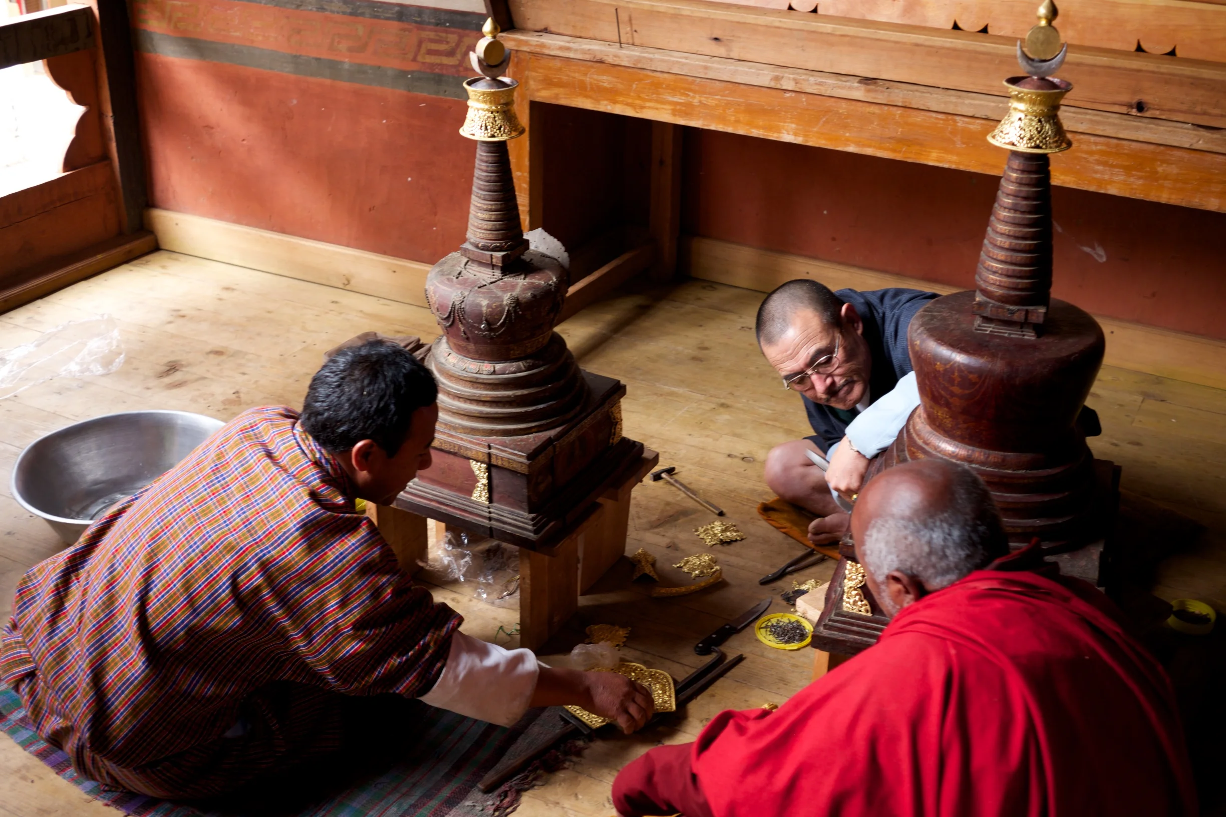 Monks at work. Bhutan.
