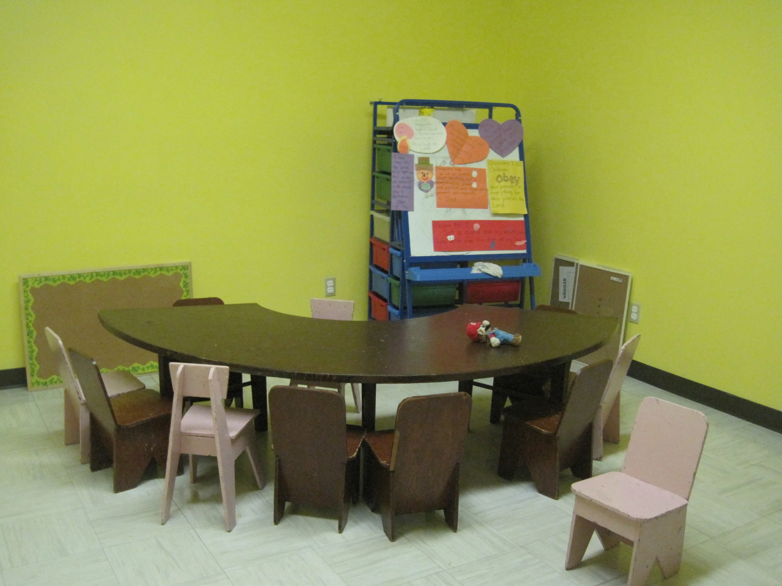 Our bright yellow Pre-K Sunday School room creates a welcome and inviting space for children to play and learn!