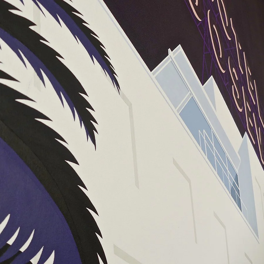 A close-up of a building's exterior with a sign that has illuminated neon text, and a section of a palm tree branch in the foreground.