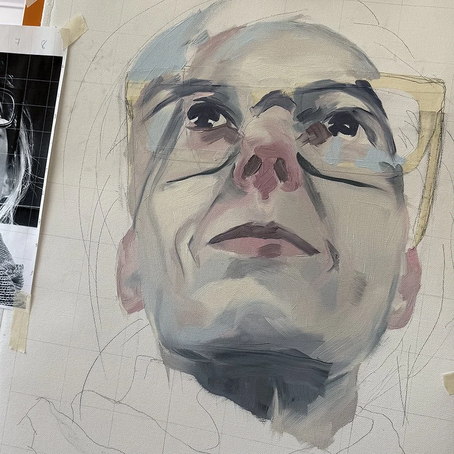 Progression of a watercolor portrait of an elderly person's face, with preliminary sketches and some painted features visible.