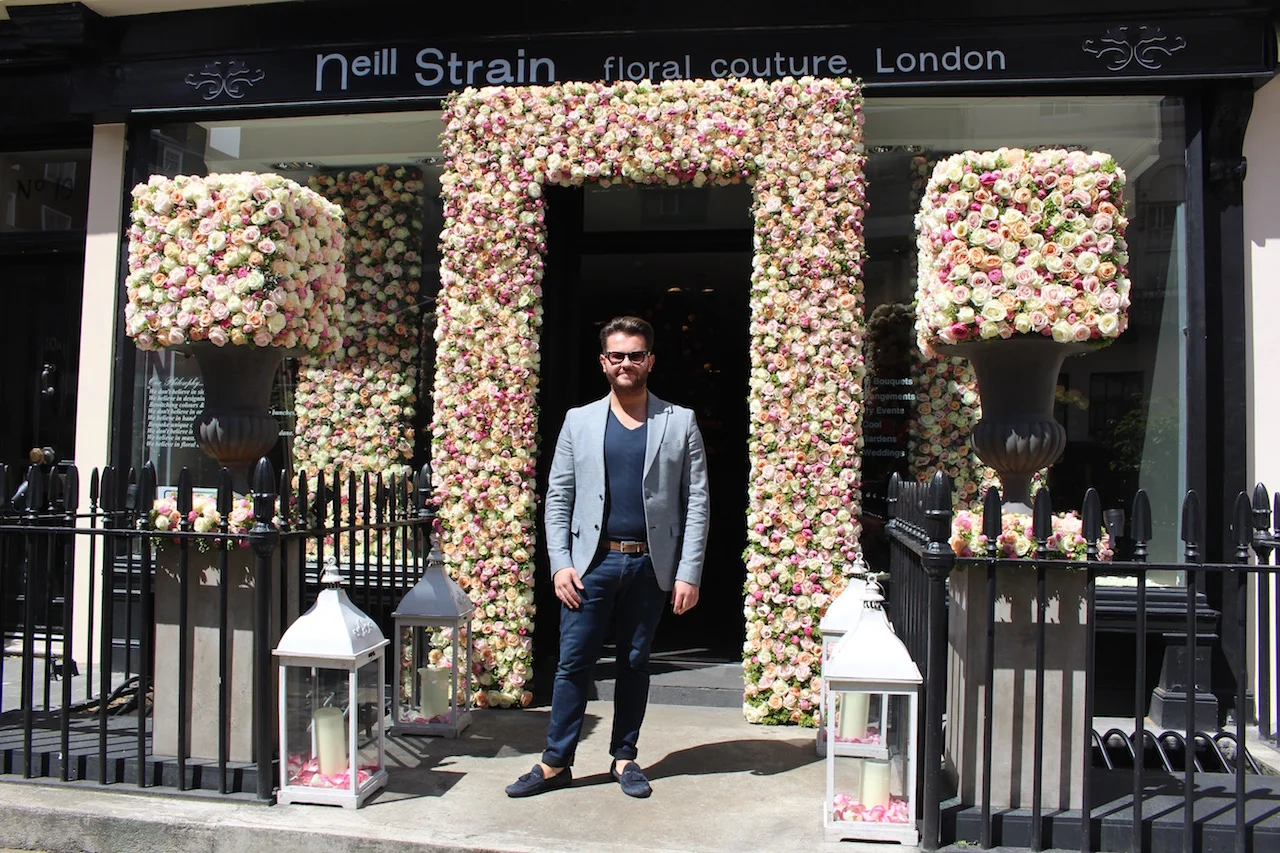 Neill Strain welcomes guests to A Celebration of the ROSE at The Flower Lounge for The Chelsea Flower Show